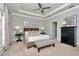 Tranquil main bedroom with tray ceilings, contemporary decor, and abundant natural light at 11510 Quiet Forest Dr, Tampa, FL 33635