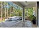 Back patio area featuring a fire pit and comfortable seating perfect for outdoor gatherings and relaxation at 11510 Quiet Forest Dr, Tampa, FL 33635