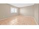 Bedroom with tile flooring and one window at 11816 Raintree Lake Ln # B, Tampa, FL 33617