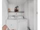 Laundry room with washer and dryer at 11816 Raintree Lake Ln # B, Tampa, FL 33617
