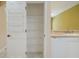 Spacious pantry with adjustable wire shelving, providing ample storage and organization at 11839 Castine St, New Port Richey, FL 34654