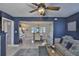 Open-concept living room with elegant furnishings and a view of the dining area at 12468 Empire Dr, Seminole, FL 33772
