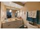 Neutral bathroom featuring a vanity with ample counter space and storage at 12803 126Th Ter, Largo, FL 33774