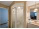 Bathroom with a shower stall, vanity and mirror at 12803 126Th Ter, Largo, FL 33774