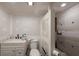 Bathroom under renovation with a new vanity, toilet, and partially completed shower area at 12803 126Th Ter, Largo, FL 33774