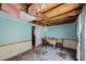 Dining room with damaged ceiling and partially-covered walls at 12803 126Th Ter, Largo, FL 33774