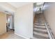 Hallway featuring stairway lift access to the second floor at 12803 126Th Ter, Largo, FL 33774