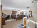 Inviting living room with tiled floor, fireplace, and ample seating, creating a comfortable and welcoming atmosphere at 12803 126Th Ter, Largo, FL 33774