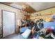 Cluttered room with damaged ceiling and assorted storage containers at 12803 126Th Ter, Largo, FL 33774