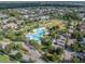 Aerial view of community pools, landscaping and neighborhood, a premier community at 14223 Lambert Bridge Ln, Lithia, FL 33547