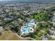 Aerial view of community pools, landscaping and neighborhood, showcasing community amenities at 14223 Lambert Bridge Ln, Lithia, FL 33547