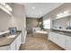 Spacious bathroom featuring a soaking tub, walk-in shower and double sink vanity with modern finishes at 14223 Lambert Bridge Ln, Lithia, FL 33547