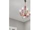 Bedroom showcasing decorative lighting fixture at 14223 Lambert Bridge Ln, Lithia, FL 33547