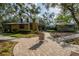 Community clubhouse with well-maintained landscaping, and clear signage for various amenities at 14223 Lambert Bridge Ln, Lithia, FL 33547