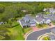 Exterior of a two-story home featuring a well-kept lawn and classic architectural design at 152 Glenn Moor Cir, Dunedin, FL 34698
