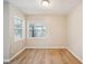 Neutral bedroom with wood-look floors, offering a versatile space for rest and personalization at 15202 Morning Dr, Lutz, FL 33559