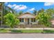 Charming single-story home featuring a manicured front yard and a quaint picket fence at 1530 21St N Ave, St Petersburg, FL 33704