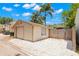 Detached one-car garage with white gravel parking area in the rear of the home at 1530 21St N Ave, St Petersburg, FL 33704