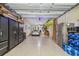 Spacious garage with ample storage, epoxy flooring, and room for multiple vehicles at 17 Franklin S Ct # C, St Petersburg, FL 33711