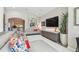 Elegant living room with stylish seating, contemporary decor, and an inviting atmosphere for relaxation and socializing at 17 Franklin S Ct # C, St Petersburg, FL 33711