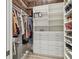 Organized walk-in closet with ample shelving, drawers, and hanging space for clothes and accessories at 17 Franklin S Ct # C, St Petersburg, FL 33711