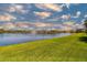 Scenic water view with fountain and lush greenery, offering a serene and picturesque setting at 17 Franklin S Ct # C, St Petersburg, FL 33711