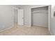 Spacious bedroom with tile flooring, closet and doorway to additional rooms at 2038 16Th S St, St Petersburg, FL 33705
