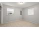 Neutral bedroom features tile flooring and two windows for ample natural light at 2038 16Th S St, St Petersburg, FL 33705