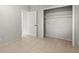 Bedroom featuring tile flooring and a large closet at 2038 16Th S St, St Petersburg, FL 33705