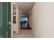 Inviting foyer with tile flooring that offers a glimpse of the open living space and outdoor views at 21209 Diamonte Dr, Land O Lakes, FL 34637