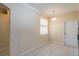 Inviting kitchen dining space illuminated by a pendant light, featuring tile floors and shuttered windows at 21209 Diamonte Dr, Land O Lakes, FL 34637