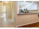 Modern kitchen with stainless steel appliances and granite countertops viewed from entry at 21209 Diamonte Dr, Land O Lakes, FL 34637
