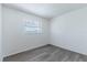 Cozy bedroom with neutral paint and modern gray flooring at 2121 23Rd Sw St, Largo, FL 33774