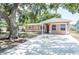 Charming single-story home with a large front yard and spacious driveway at 2121 23Rd Sw St, Largo, FL 33774