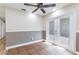 A view into the bright, airy kitchen shows stainless steel appliances and dark wood cabinets at 2121 23Rd Sw St, Largo, FL 33774