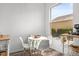 Bright eat-in kitchen space with a large window looking to the outside at 2227 North Creek Ct, Sun City Center, FL 33573