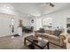 Inviting open-plan featuring a living room with carpet, a dining area and views into the kitchen at 2227 North Creek Ct, Sun City Center, FL 33573