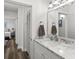 Bright bathroom with marbled countertops, a unique sink and walk-in access to a nearby bedroom at 2720 14Th N Ave, St Petersburg, FL 33713