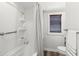 Cozy bathroom with a tiled shower, toiletries, and a small window bringing in lots of natural light at 2720 14Th N Ave, St Petersburg, FL 33713