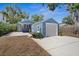 A single car garage with an extended driveway sits aside the home in this neighborhood at 2720 14Th N Ave, St Petersburg, FL 33713