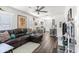 Open living room with modern decor, wood floors, and seamless kitchen access at 2720 14Th N Ave, St Petersburg, FL 33713