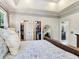 Primary bedroom with a walk-in closet and ensuite bathroom at 3003 W Leila Ave, Tampa, FL 33611