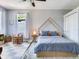 Charming bedroom with unique bed frame, playful decor, and a cozy area rug at 3003 W Leila Ave, Tampa, FL 33611