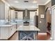 Spacious kitchen features a large center island and stainless steel appliances at 3003 W Leila Ave, Tampa, FL 33611