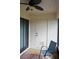 Cozy lanai features a ceiling fan and convenient access to outdoor storage at 311 Kelsey Way # 3, Sun City Center, FL 33573