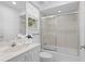 Clean bathroom featuring a shower over tub, vanity and towels at 3702 54Th W Dr # 104, Bradenton, FL 34210
