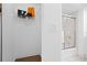 Walk-in closet featuring shelving and an adjacent bathroom with a shower over tub at 3702 54Th W Dr # 104, Bradenton, FL 34210