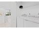 Functional laundry room with modern washer and dryer, plus storage at 3702 54Th W Dr # 104, Bradenton, FL 34210