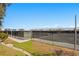 View of the tennis courts with netting, offering a great space for recreational play and exercise at 3702 54Th W Dr # 104, Bradenton, FL 34210