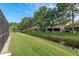 This home offers a well-maintained lawn and serene waterway views at 3875 Darston St, Palm Harbor, FL 34685